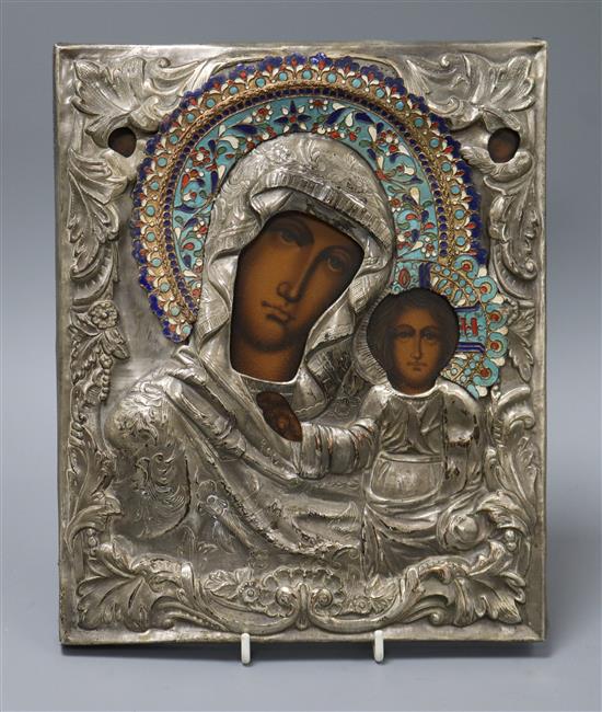A Russian icon with metal oklad 26 x 21.5cm